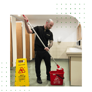Tiago mopping floors