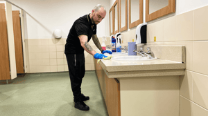 tiago cleaning washroom