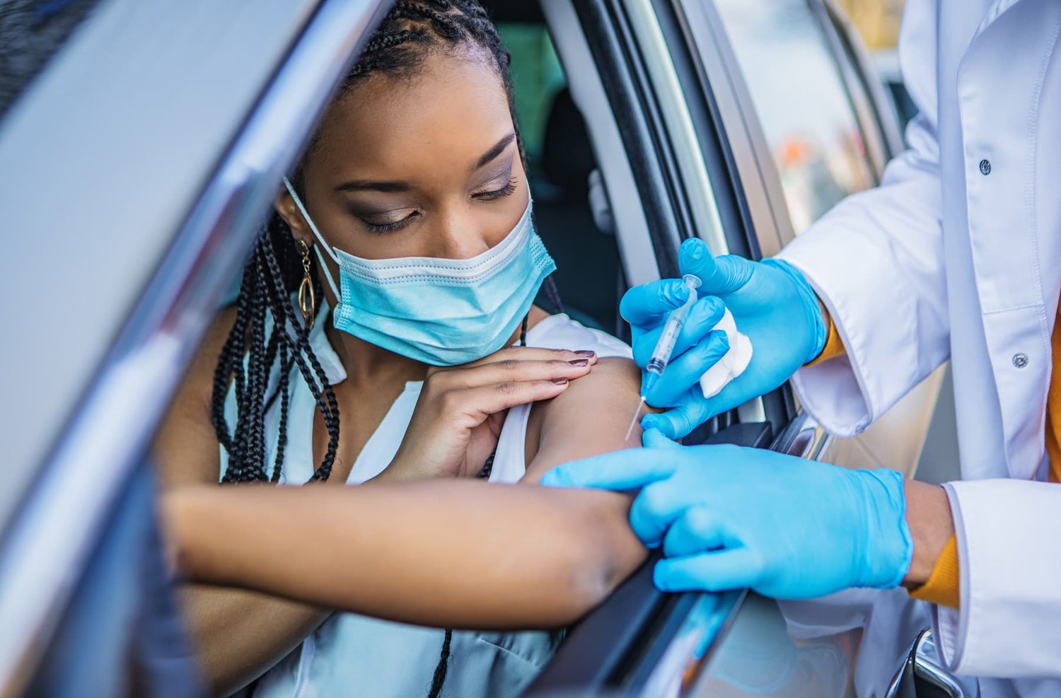 Woman getting vaccination for COVID-19
