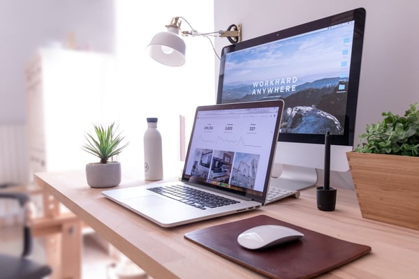 It's 2021: Is the digital workspace here to stay? - image of laptop and computer in the digital workspace