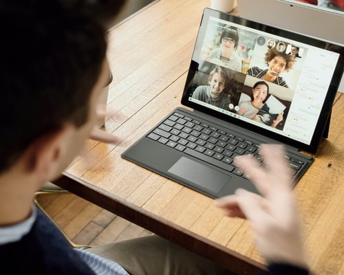 Every office department's favourite thing about never going to the office again - image shows people having a meeting over video conferencing while working from home