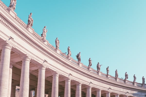 10 myths why you can't move to WVD this year - image of statues on a building and a blue sky