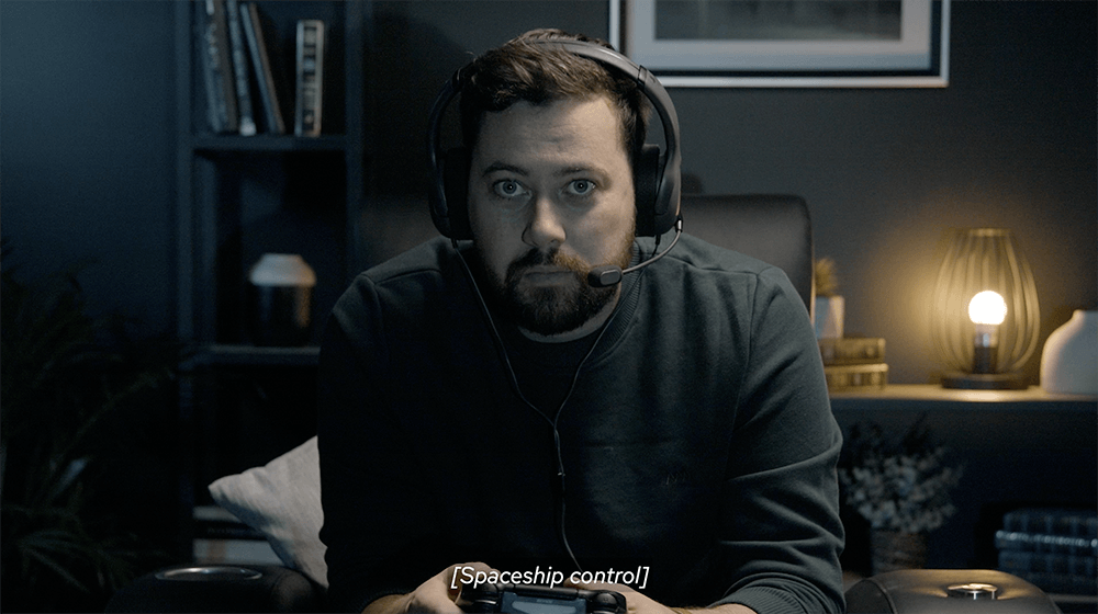 Man-playing-game-in-haptic-chair