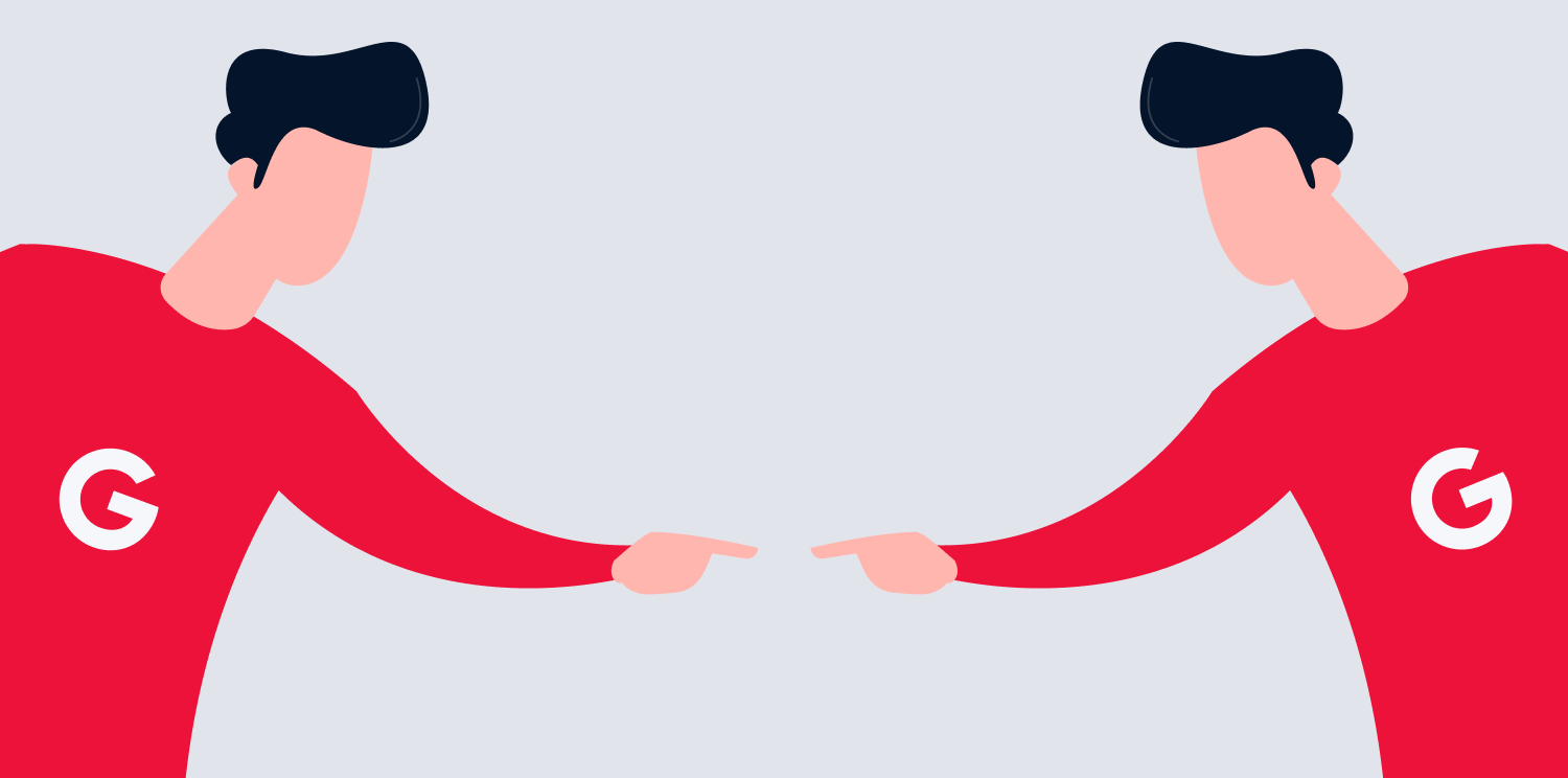 Two men pointing at each other