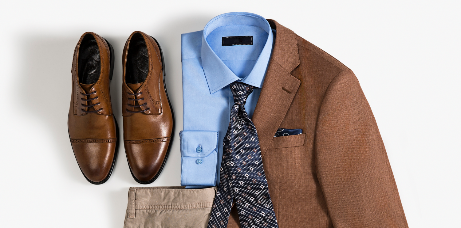 Formal clothing including a jacket, shirt, tie, pants, and shoes