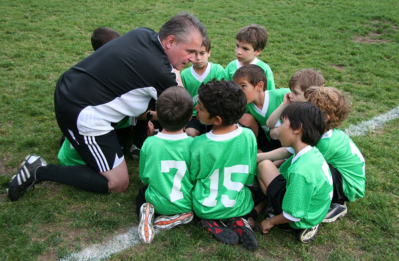 What qualifications do I need to be a football coach? Image