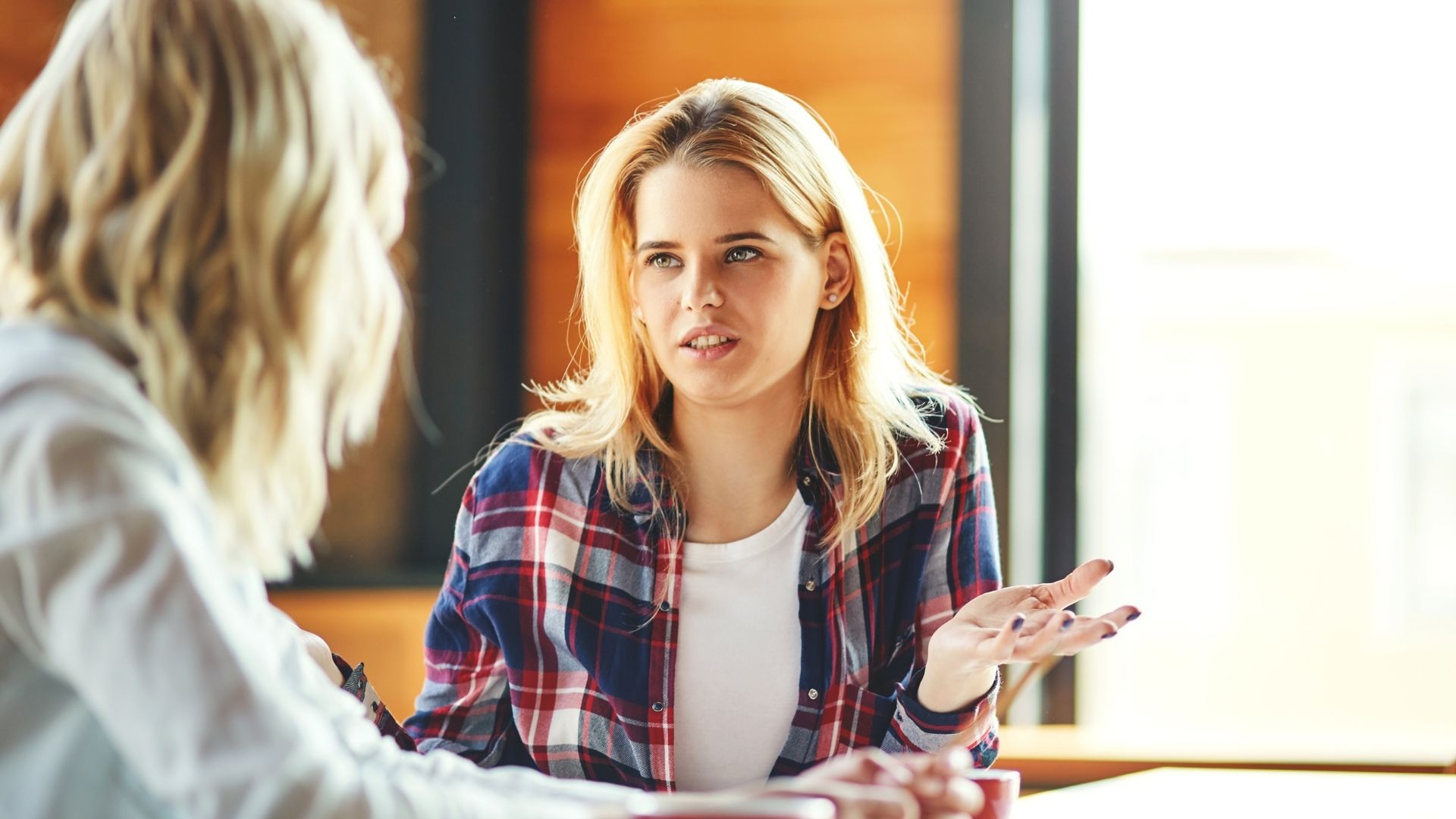 Blonde girl discussing