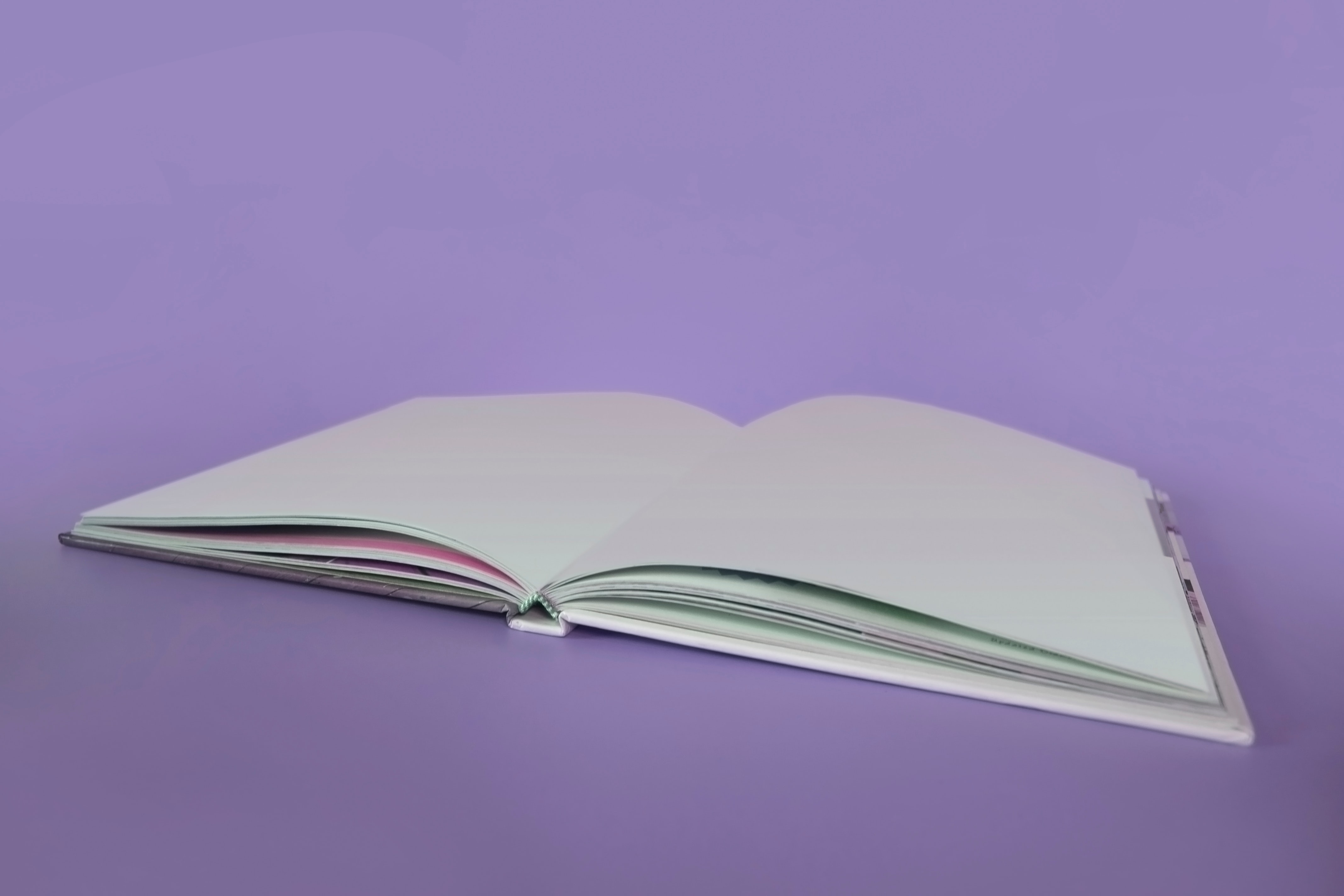 Book on purple background