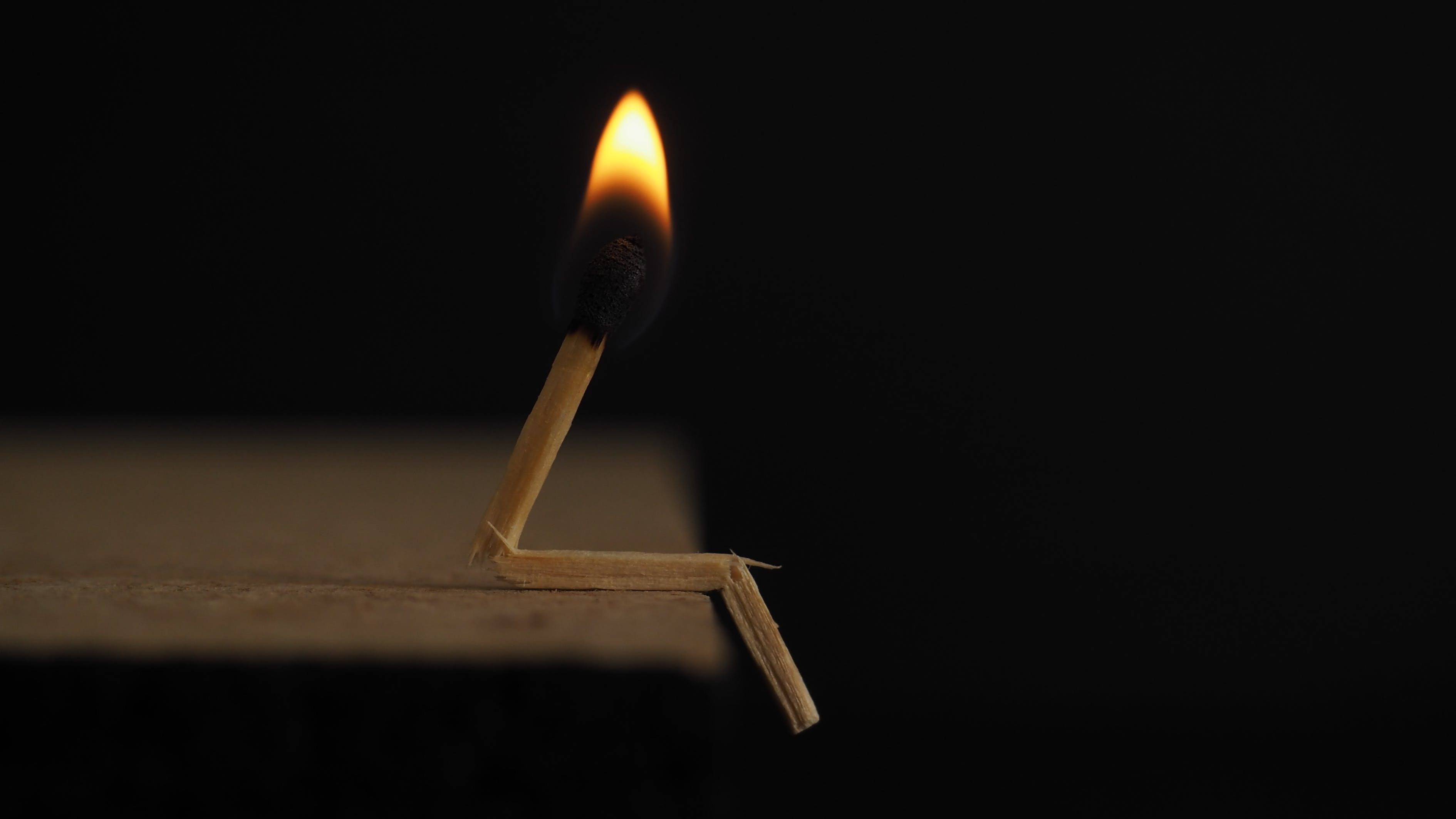 Burning matchstick