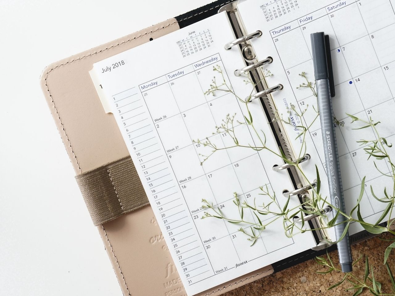 Calendar notebook with pencil