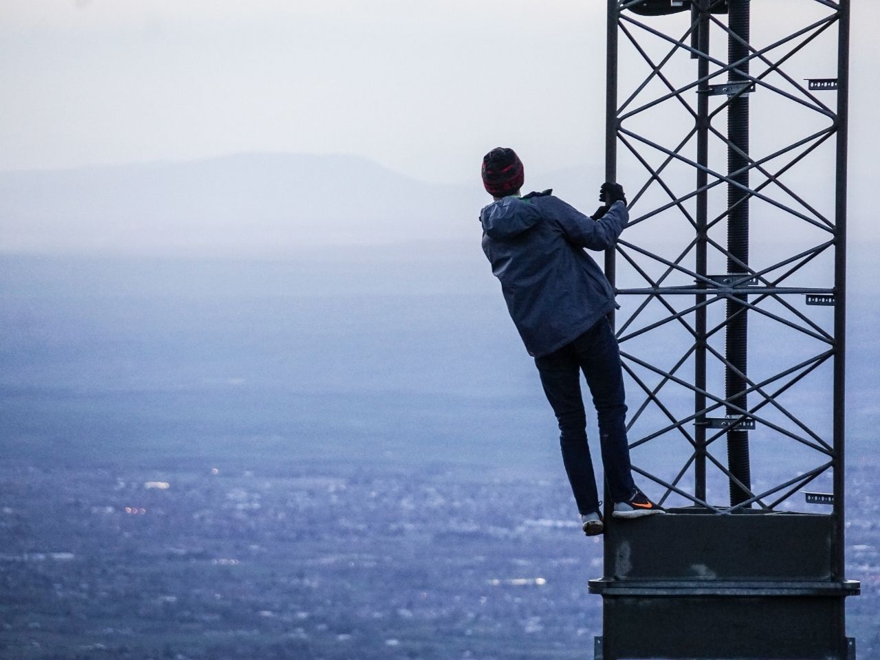 Man climbing on a tower