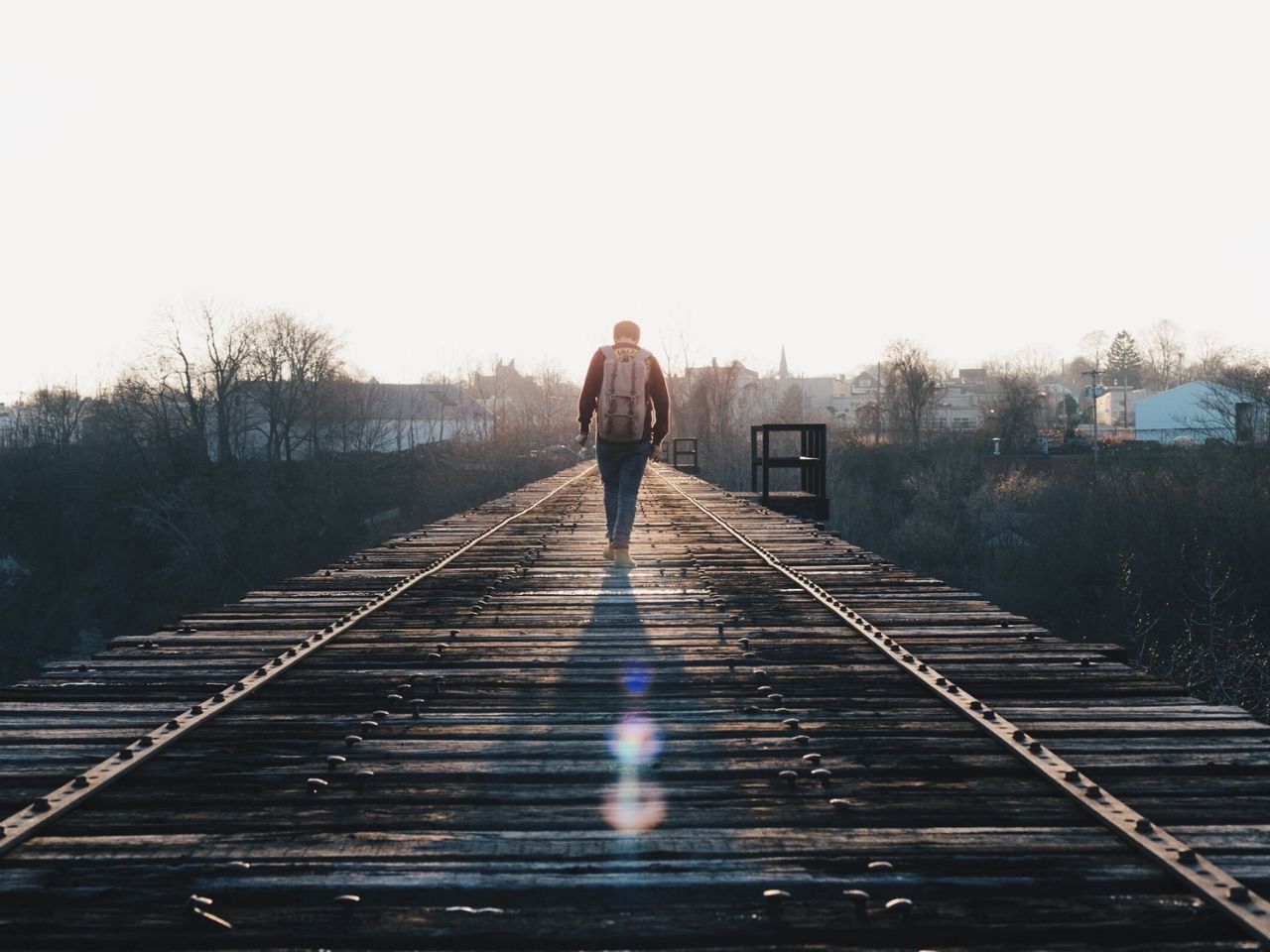 Man walking on a bridge