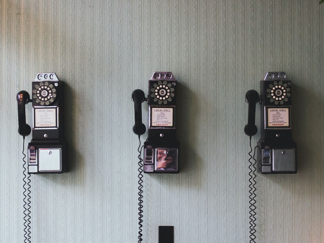 Old phone on a wall