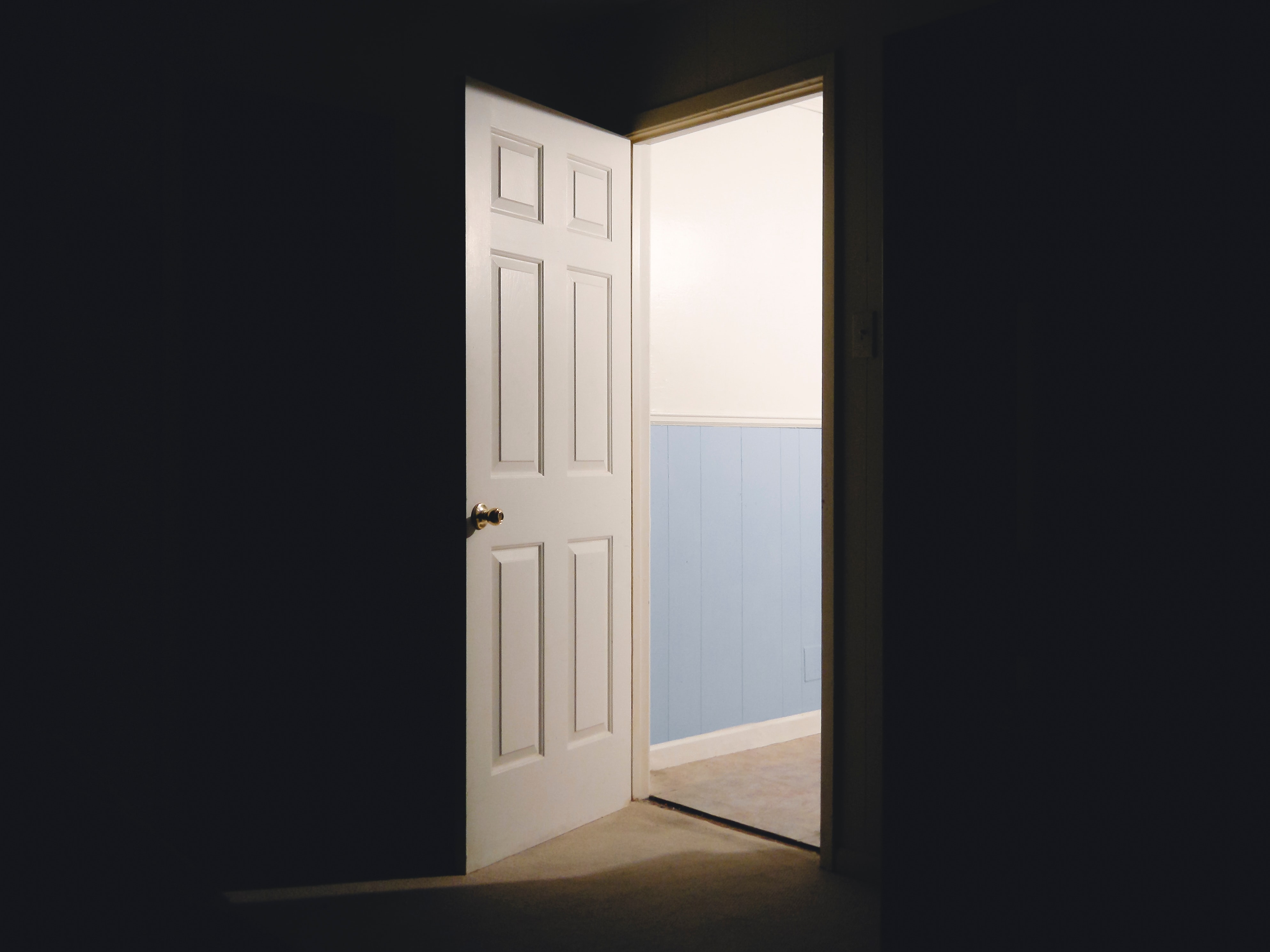 Open door into bright room