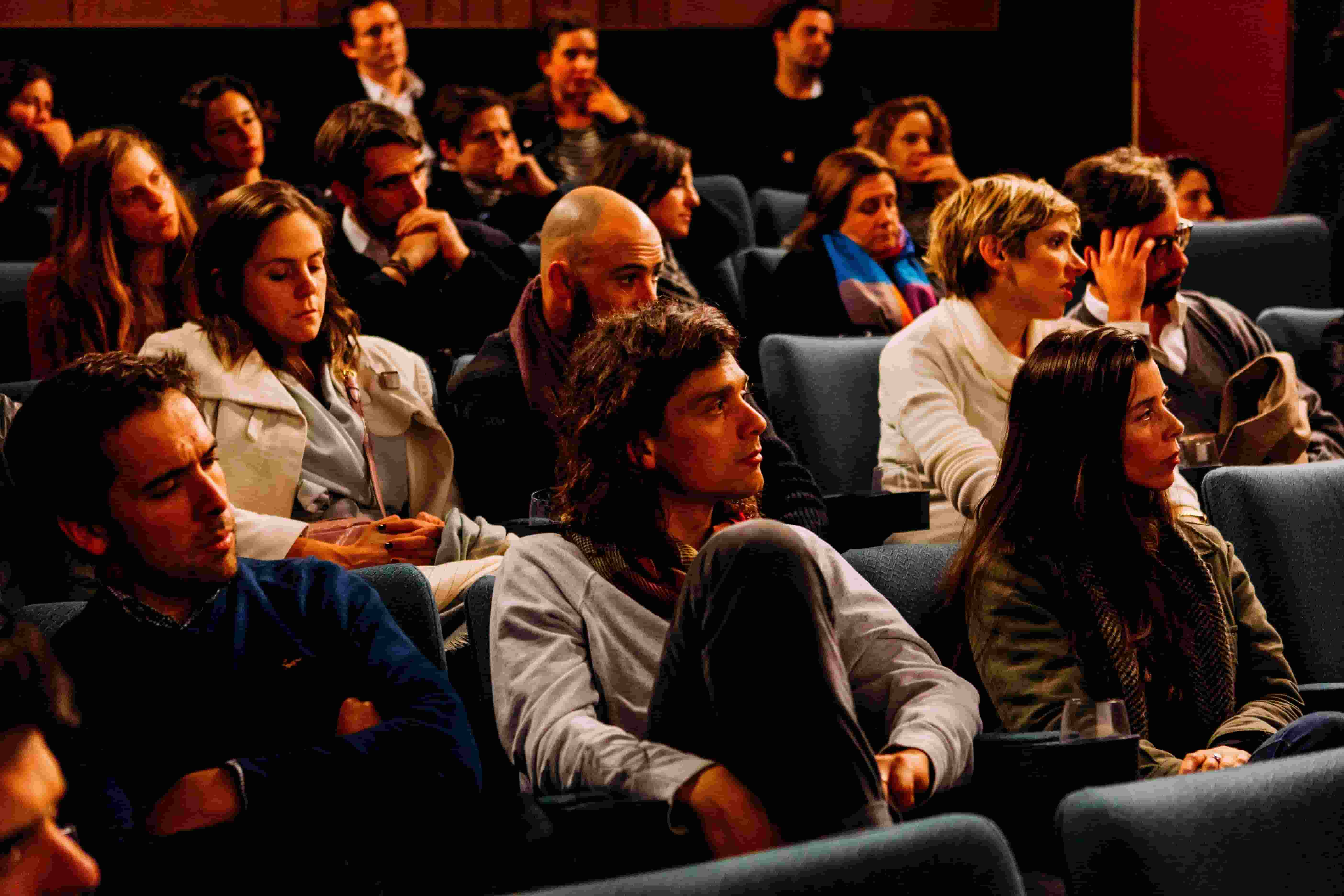 People sitting on lecture benches