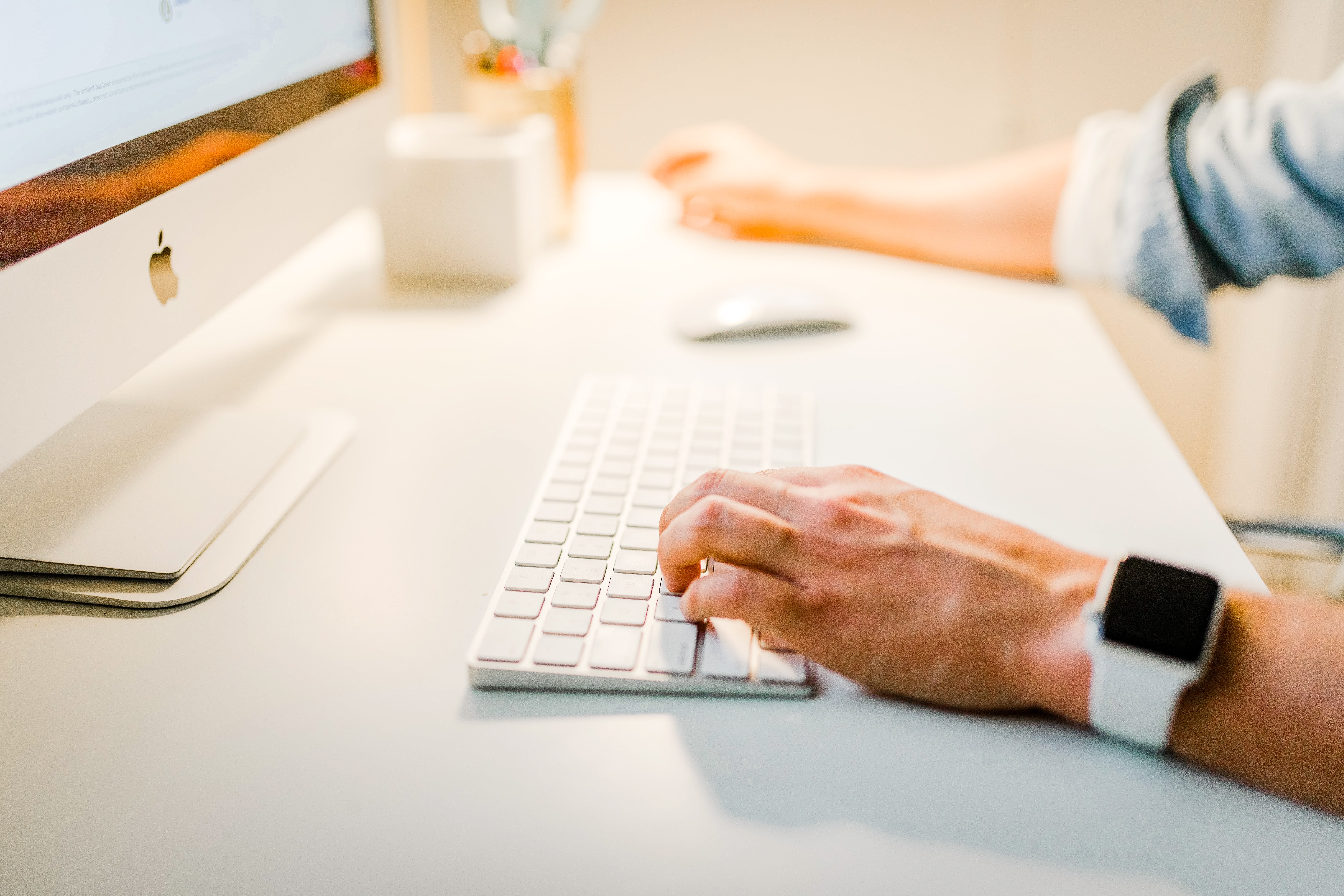 Person sitting at iMac