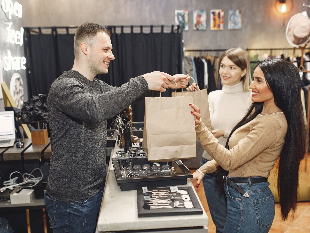 Woman receiving a bag of paper