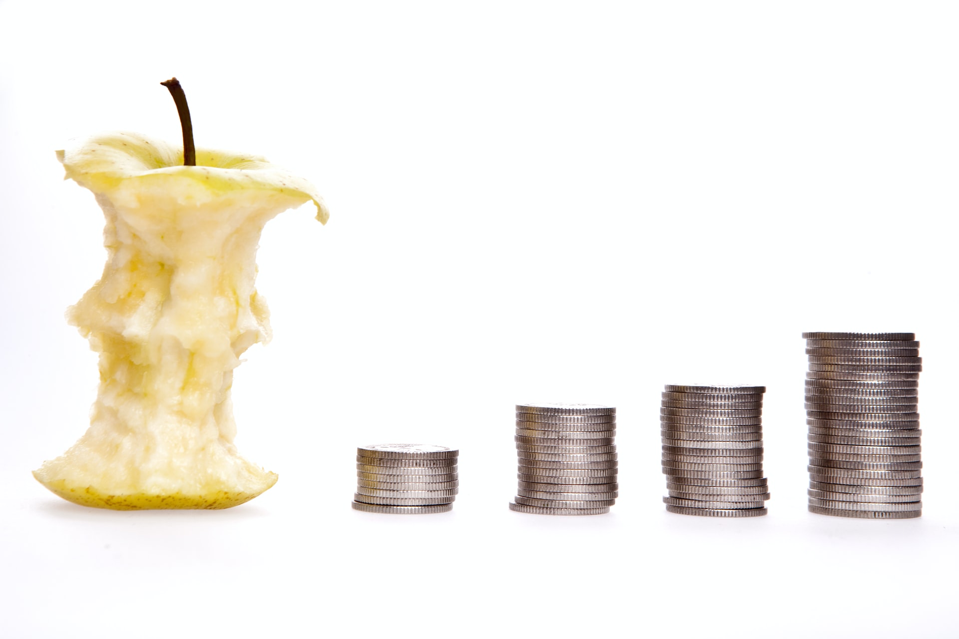 Yellow apple core with silver coins