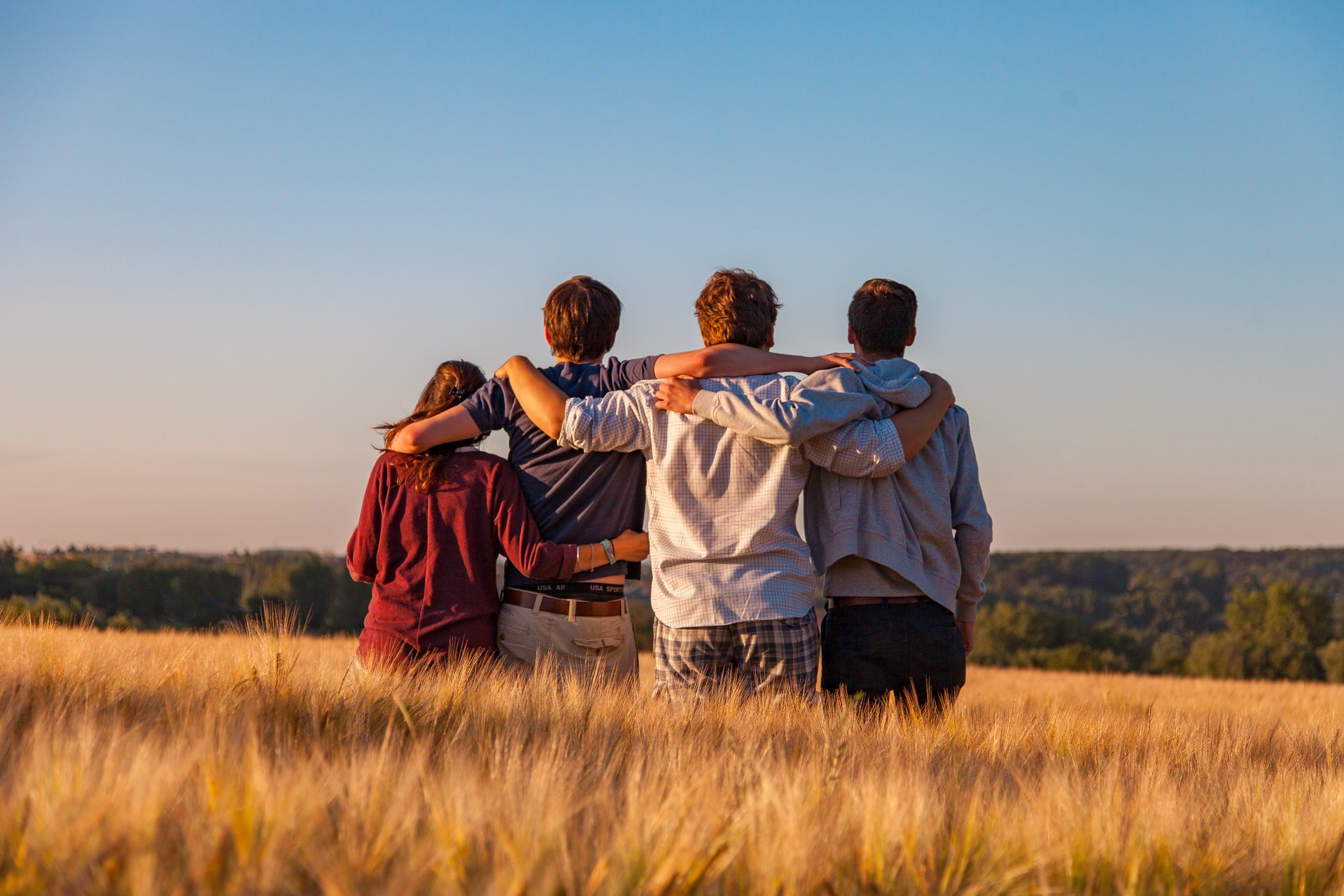 Young persons standing outside