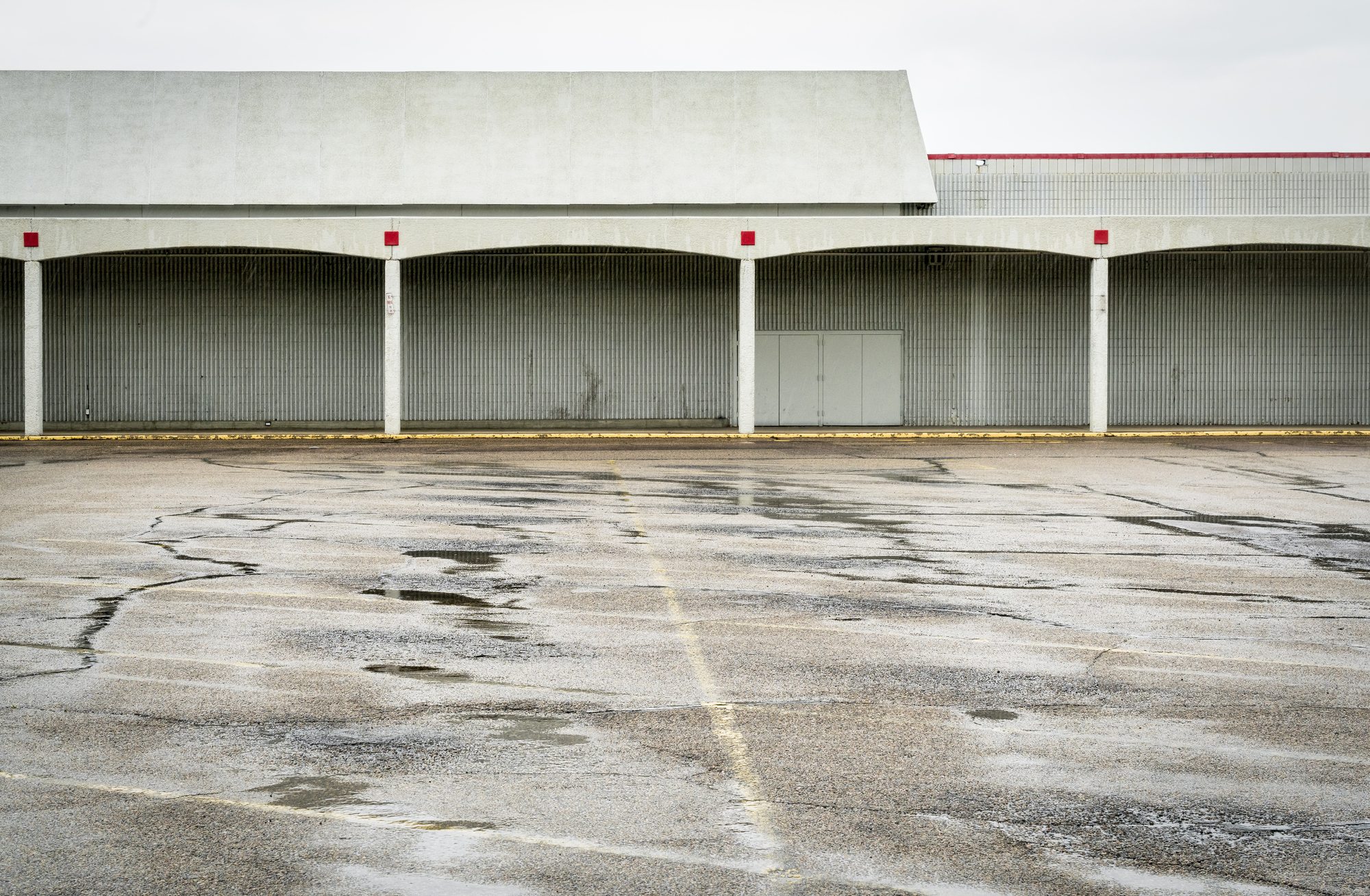 Empty parking lot of a shut down mall