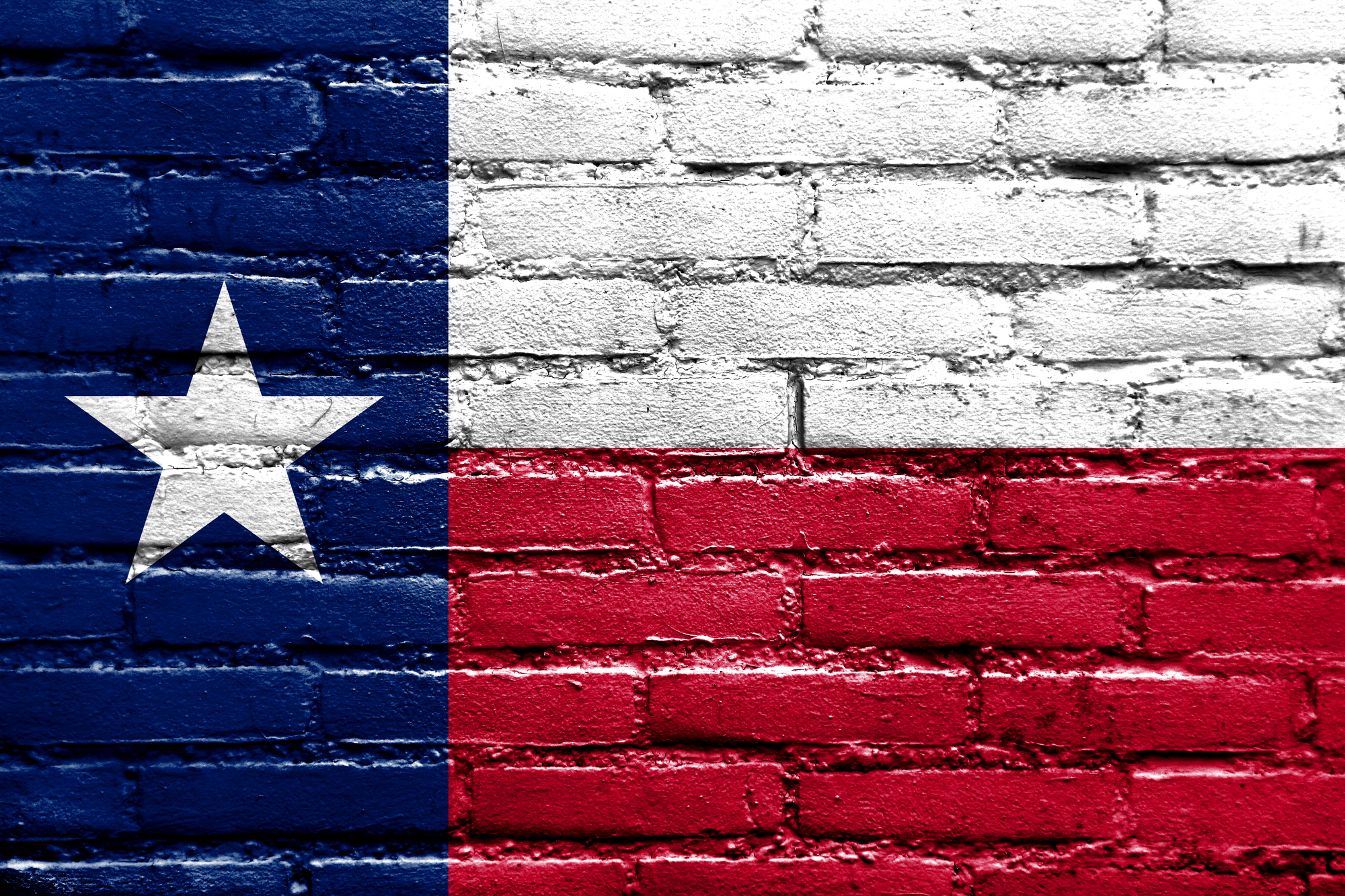 Texas State Flag painted on brick wall