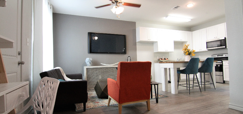 Renters love our open floor plans, like this living room and kitchen.