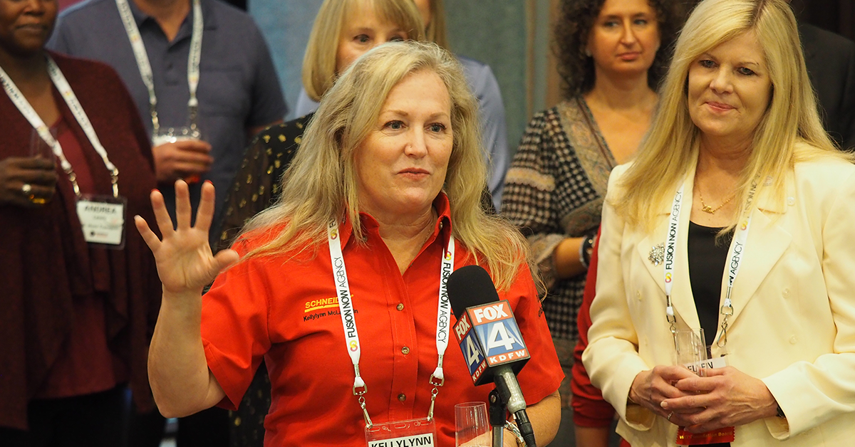 Women In Trucking Driver Ambassador Kellylynn McLaughlin speaking