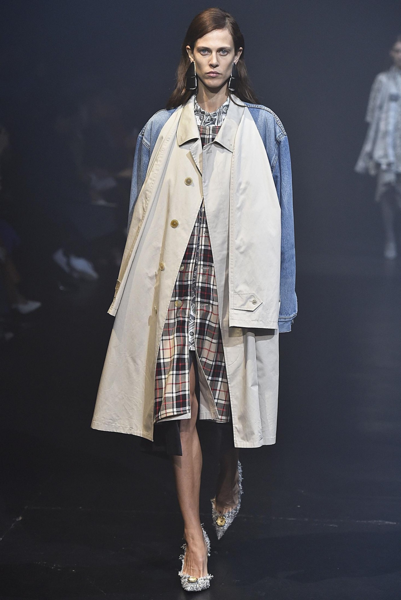 Balenciaga's take on Spring 2018 outerwear is a lesson in deconstruction.